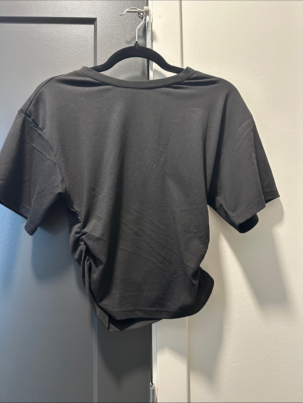 Women’s ruched side black tee